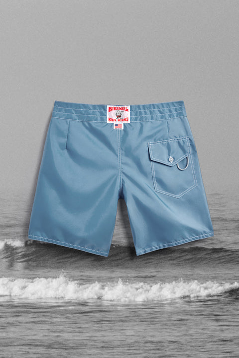 Back View of the Federal Blue 300 Boardshort over Black and White Image of Waves