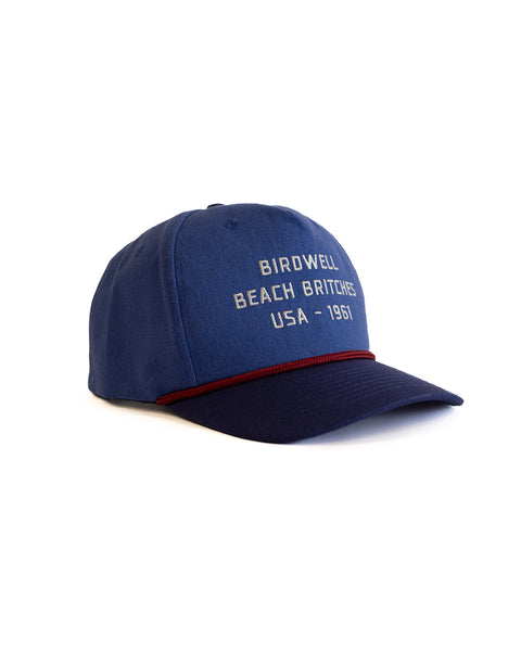 The Trademark Hemp Snapback in Federal Blue/Navy is a 5-panel hat featuring 