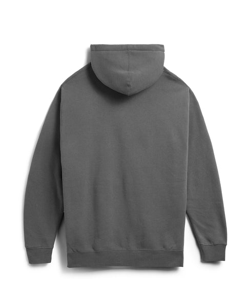 The Mashed Potato Hoodie in Faded Black features a relaxed fit, long sleeves, a hood, and no visible logos or designs. Shown from the back, its fabric appears soft and slightly textured.