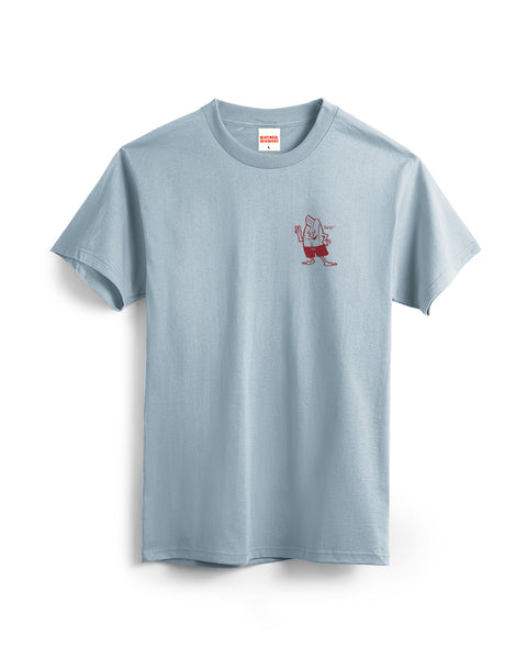 The Custom T-Shirt - Arctic Blue is a heavyweight, garment-dyed short-sleeve tee in light blue, featuring a small red cartoon character with raised arms on the left chest. Displayed on a white background.