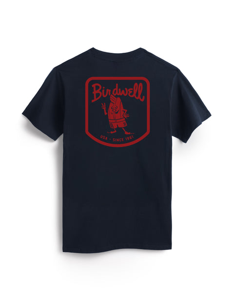 The Herald T-Shirt - Navy is a heavyweight tee with a large red Birdwell logo and cartoon mascot on the back, plus 