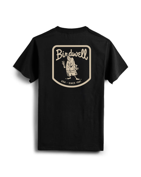 The Herald T-Shirt - Black is a heavyweight, 100% cotton tee, garment-dyed for comfort. It features a large beige and white back graphic: Birdwell text, a cartoon with trident, and 