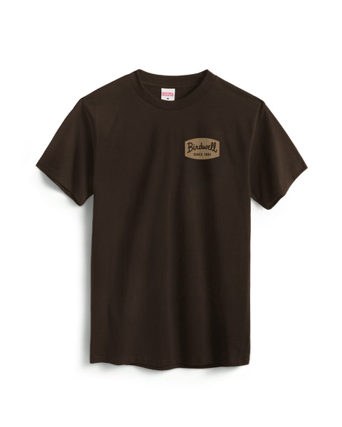 The Herald T-Shirt - Java is a plain brown, garment-dyed cotton heavyweight tee featuring a small beige 