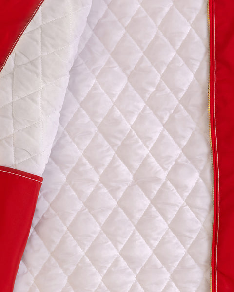 Close-up of the Quilt Lined Racing Jacket - Red/White/Black, featuring diamond-quilted white fabric with red trim, gold piping, and white stitching—classic details inspired by vintage racing jacket design.