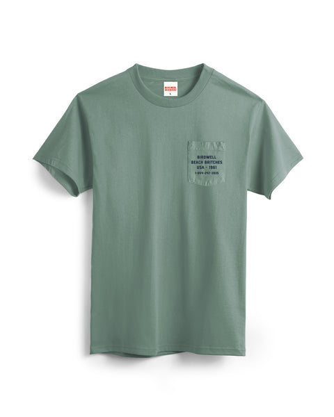 The Van Life Pocket T-Shirt in Atlantic Green is a garment-dyed tee with short sleeves and a chest pocket printed with: SEAGROVE BEACH, FL 32459 850-267-2081.