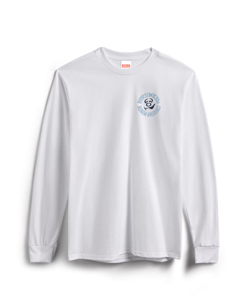 The Rounder Long Sleeve T-Shirt - White is a heavyweight, garment-dyed cotton top with ribbed cuffs and a small blue circular Powell High Breaks 8-ball graphic on the upper left chest, shown against a white background.