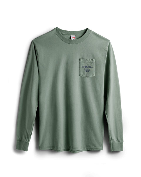 The Tourist Long Sleeve Pocket T-Shirt in Atlantic Green is a heavyweight, crewneck, long sleeve tee made in the USA from soft cotton. 