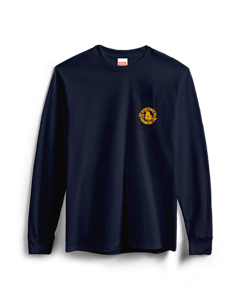 The Shaka Long Sleeve Pocket T-Shirt - Navy is a heavyweight cotton tee with long sleeves, a pocket, and a small circular yellow-orange lion graphic on the left chest reading SUPREME QUALITY, shown flat on a white background.