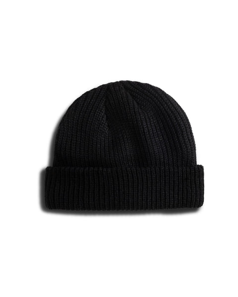 The License Plate Watchcap - Black is a wide ribbed fisherman-style beanie with a folded brim, shown on a white background.