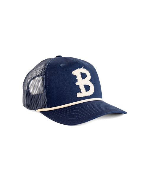The Big B Twill Snapback - Navy is a navy cotton hat with a white mesh back and a prominent white 