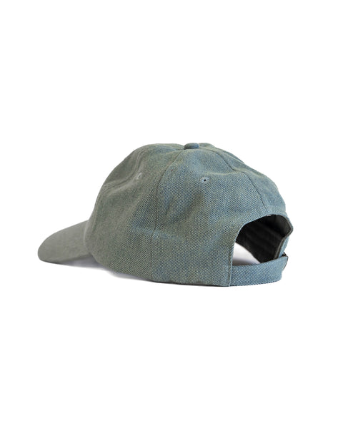 The Daddy Denim Hat - Medium Wash is displayed from the back, highlighting its adjustable strap and metal clasp, set against a white background.