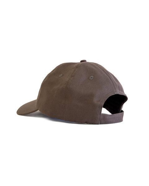The Daddy Twill Hat in washed black is an unstructured dad hat, shown from the back with a curved brim and adjustable strap.