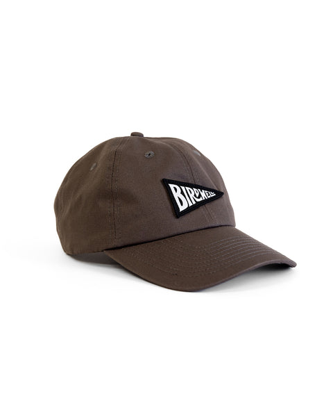 The Daddy Twill Hat - Washed Black is an unstructured cotton dad hat with a curved brim and a black and white 