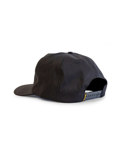 The OG Twill Snapback - Black is a cotton snapback hat shown from the back, with a curved brim and an adjustable snap closure. The background is plain white.