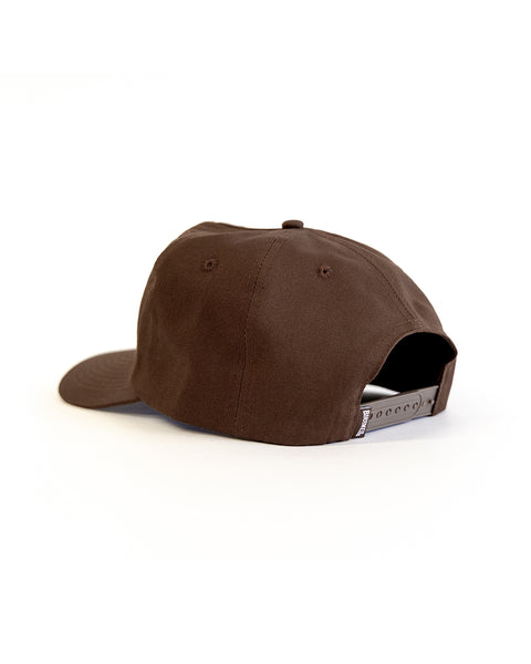 The OG Twill Snapback - Brown is a 5-panel cotton hat shown from the back, featuring an adjustable snap closure and two top ventilation holes, set against a plain white background.
