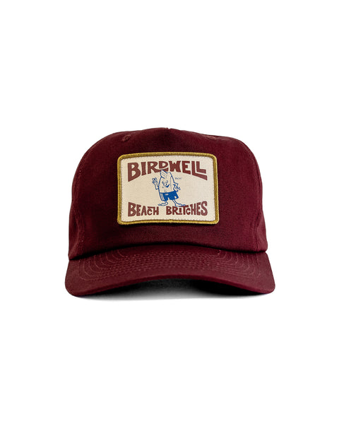 The OG Twill Snapback - Burgundy is a maroon 5-panel baseball cap with a rectangular patch reading 