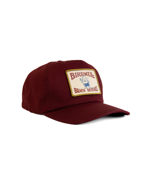The OG Twill Snapback - Burgundy is a maroon 5-panel cotton twill cap with a curved brim and a front rectangular patch reading 