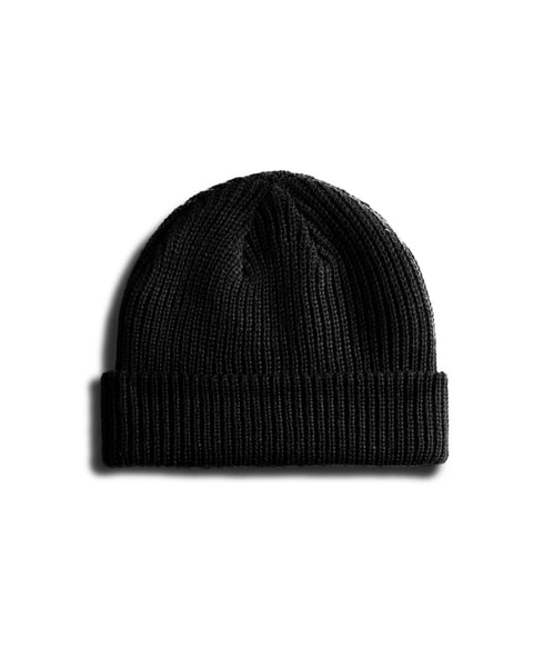 The Aloha Watchcap - Black is a ribbed beanie hat with a folded brim, shown on a white background.