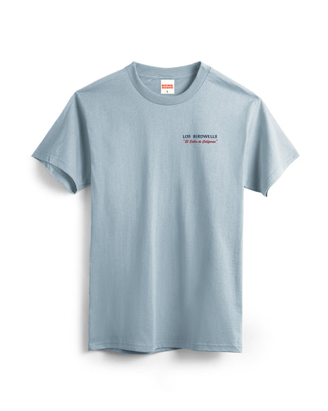Los Birdwells T-Shirt - Arctic Blue: a light blue garment-dyed cotton tee with short sleeves and small 