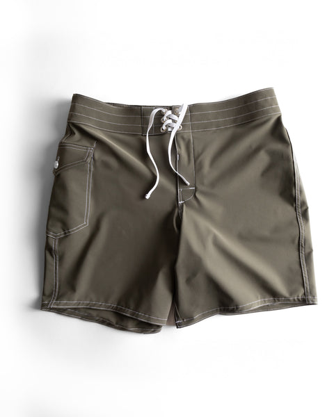 808 SurfStretch Side Pocket Boardshorts - Army: olive green boardshort with white stitching, front lace-up closure, and side button pocket, shown flat on a white background.