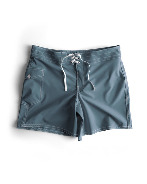 806 SurfStretch Side Pocket Boardshorts in Federal Blue, featuring white stitching, a front lace-up closure, and a side pocket, shown flat on a white background.