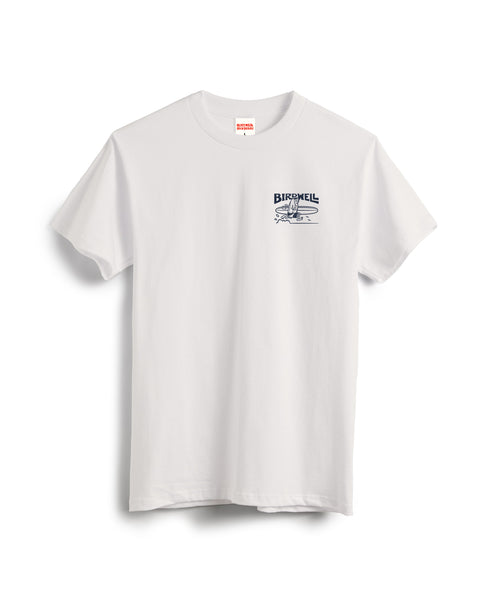 The Bros T-Shirt - Vintage White is a plain white, short-sleeve cotton tee with a small blue BIRDWELL bird-on-branch graphic on the left chest, garment-dyed for added charm. Displayed on a white background.