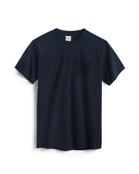 The Pennant Pocket T-Shirt - Navy is a heavyweight cotton tee with a round neck and left chest pocket, made in the USA, shown on a white background.