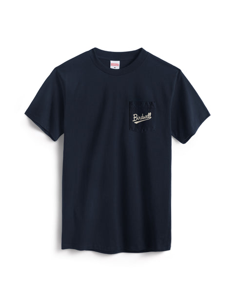 The Baller Pocket T-Shirt in navy is a heavyweight cotton tee with a chest pocket featuring 