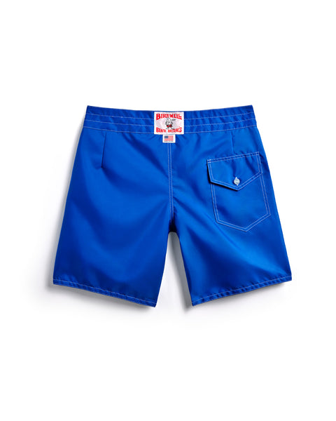 The 300 Boardshorts in Royal Blue are shown from the back, featuring a single flap pocket with button closure and a white Birhemell label at the waistband. Made from durable SurfNyl fabric for comfort in and out of the water.