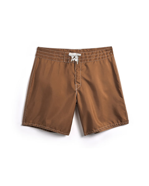 300 Boardshorts - Tobacco: tobacco-colored boardshorts featuring white stitching, a white waist drawstring, and a classic, simple design, shown laid flat on a white background.