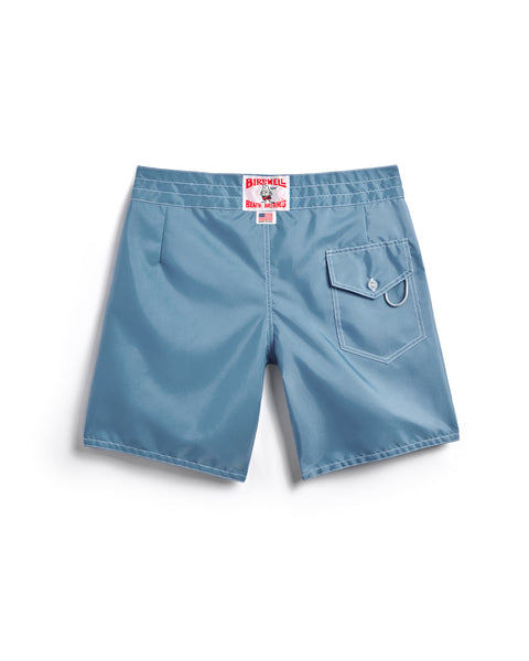 Federal Blue 300 Boardshorts shown from the back, featuring a single right-side flap pocket with button and a red and white waistband label; made in USA.
