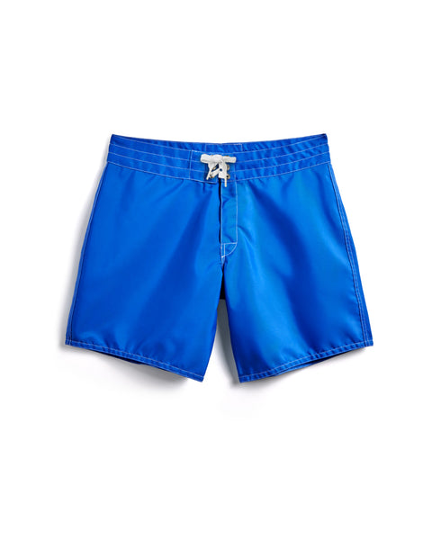 The 310 Boardshorts in Royal Blue, crafted from durable SurfNyl fabric, feature a white drawstring and mid-thigh length, shown flat on a white background.