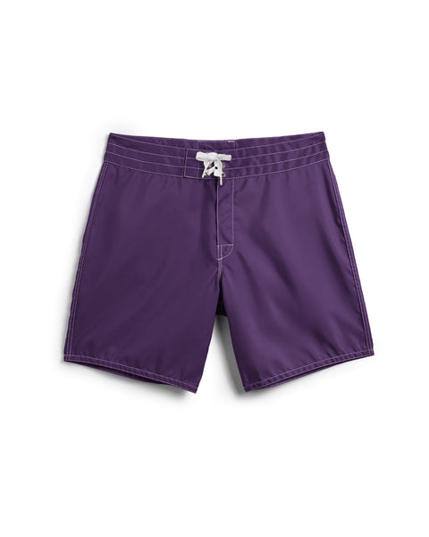 The 300 Boardshorts - Purple feature white stitching and a white drawstring at the waist. Made in the USA, they are displayed against a plain white background.