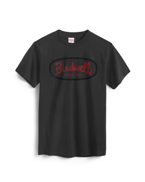 The Mashed Potato T-Shirt in charcoal is a heavyweight cotton tee with a red and dark blue Birdwell Since 1961 logo on the chest, shown on a white background.