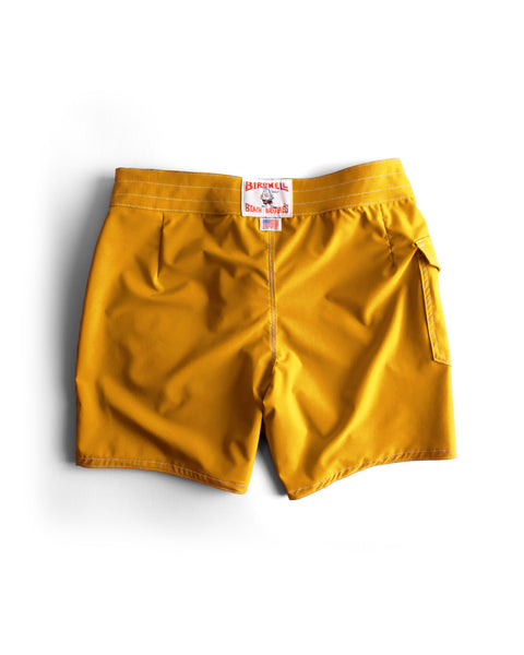 The 808 SurfStretch Side Pocket Boardshorts in Gold feature side pockets and a white waistband label reading 