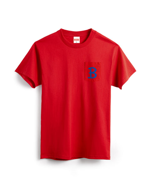The Script Pocket T-Shirt - Tomato is a garment-dyed, heavyweight red tee made in the USA, featuring a left chest pocket with a blue 