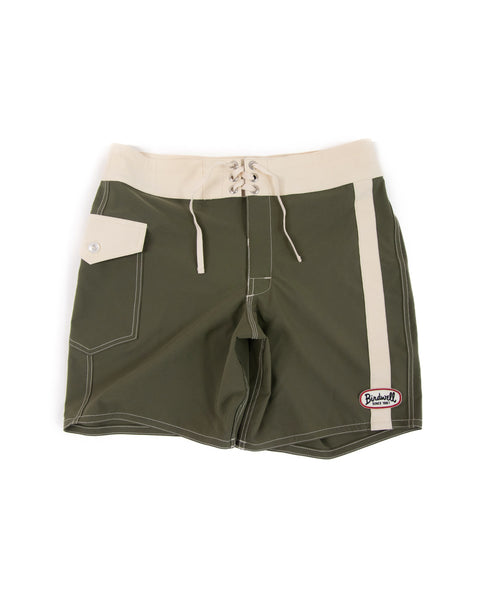 The 808 Mono Stripe - Army/Bone boardshort features olive green SurfStretch fabric, a cream waistband, lace-up front, cream side stripe, flap pocket, and Birdwell patch near the hem. Proudly made in the USA.