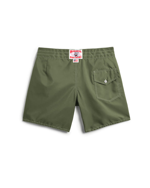 310 Boardshorts - Olive, shown from the back, have a single right-side buttoned pocket and a red-and-white label on the waistband.