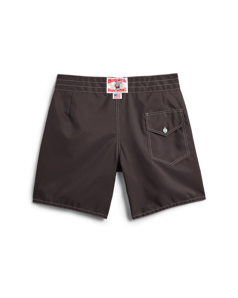 Brown shorts with a visible brand label on a white background