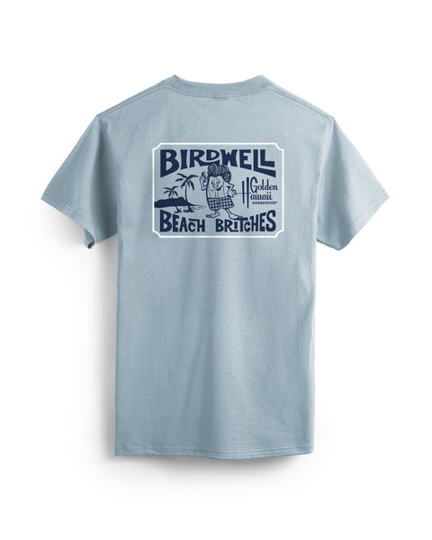 The Golden Hawaii T-Shirt - Arctic Blue is a light blue cotton tee with a large vintage-style navy graphic on the back featuring 