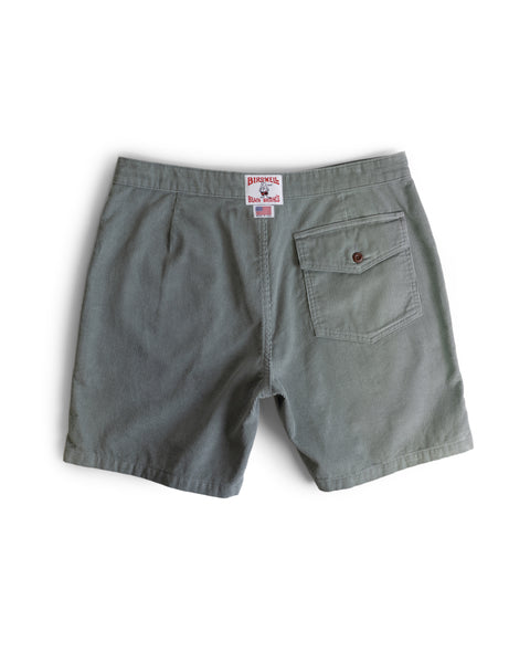 The Classic Corduroy Shorts - Eucalyptus are shown from the back with a single buttoned pocket, red and white brand label above the pocket, and an adjustable drawcord waist for comfort.