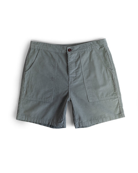 A pair of Classic Corduroy Shorts - Eucalyptus with front patch pockets, button closure, and visible stitching is laid flat on a white background.