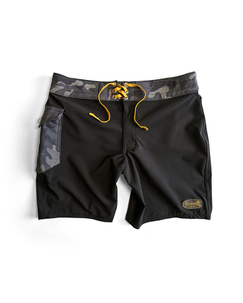 The 808 Powerbird - Black boardshorts feature a yellow drawstring, camouflage waistband, side pocket, and 8