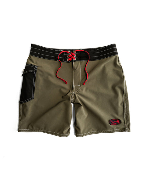 The 808 Powerbird - Dark Olive boardshorts feature a medium length, white stitching, black waistband, red drawstring, black left-leg pocket, and a red & white Birdwell patch by the right hem. Water-repellent—perfect for surf adventures.