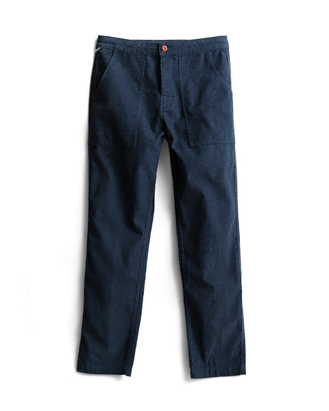 Classic Corduroy Pants - Navy, featuring a straight-leg fit with front patch pockets, a SurfNyl fly, and a front button closure—showcasing Birdwell’s simple, casual design—are laid flat on a white background.