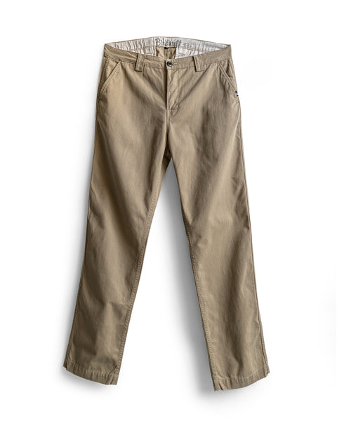 The Stockman Chino Pants - Khaki, crafted from cotton twill in a relaxed fit chino style with front pockets, button closure, and belt loops, are shown laid flat on a white background.