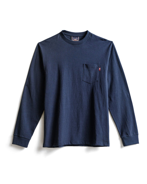 The High Tee Pocket Long Sleeve - Navy is a 100% cotton, crew neck long sleeve t-shirt featuring a small chest pocket on the left side. Made in the USA, it is shown laid flat on a white background.