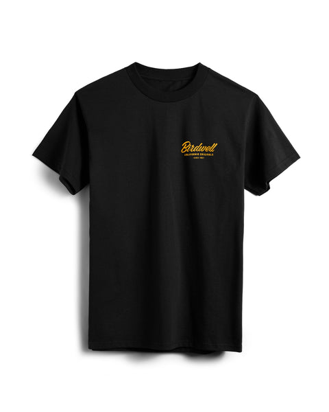 The Daydreamin' Birdie T-Shirt - Black is a short-sleeve cotton heavyweight tee with the classic Birdwell design and yellow text on the left chest, shown against a white background.