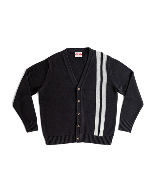 The Racing Cardigan Sweater - Black/Gray features a V-neck, two vertical white stripes on the left, ribbed cuffs and hem, a regular fit, and is shown laid flat on a white background.