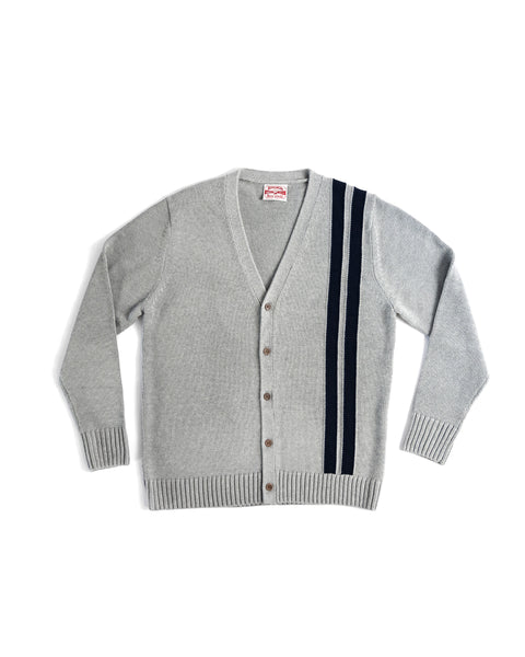 The Racing Cardigan Sweater in gray/navy features a regular fit, V-neck, ribbed cuffs and hem, cotton-blend fabric, and two navy blue stripes running from shoulder to hem on one side.
